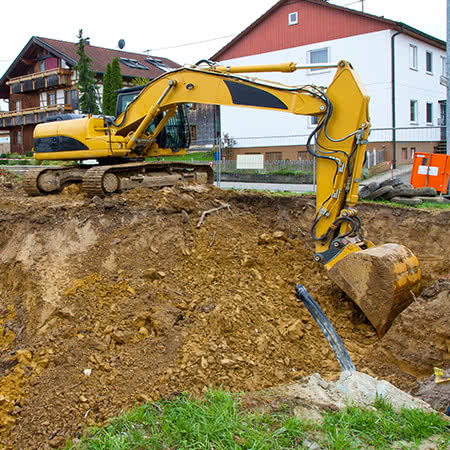 Bauherrenhaftpflichtversicherung - Bagger auf ner Baustelle